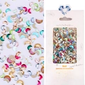 Detail of moon-shaped nail rhinestones in mixed colors with retail card packaging - #06 Moon Shaped