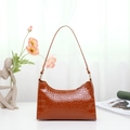 Caramel brown crocodile embossed moon hobo bag for women with sleek shoulder strap - Brown