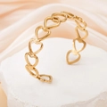 Elegant gold hollow heart-shaped open bangle made of high-quality stainless steel - Hollow Heart / Gold