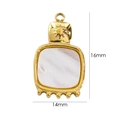 Detail view of a 16x14mm 14K gold-plated shell pendant with sun engraving and bead accents - 7111-Sun Beaded Square