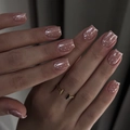Elegant nude press-on nails with white polka dots and glossy finish for a minimalist look. - JP4208 Style