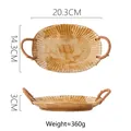 Japanese style oval stoneware tray with rattan handles and radial textured patterns - Brush Stroke Chrysanthemum Plate with Rope