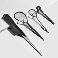 4-piece black plastic hair styling tool set with tail comb and hair loop tools - Black 4-Piece Set