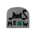 Detail of grey knitted beanie featuring black cat jacquard and green paw print with MEOW text - M (56-58cm) / Gray