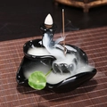 Black glossy ceramic backflow incense burner with smoke waterfall and green leaf detail - Small Stream Flowing Long