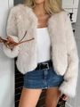 Close-up of beige faux fur coat texture and soft plush long hair fluffy material - S / Off White