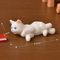 Realistic white miniature cat figurine with blue eyes in side-lying pose, size 4.5x2.4cm - No.6 Lying White Cat