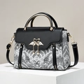 Chic handbag with metal handle, swan heart clasp, and patterned fabric in crossbody style - Wave Pattern/Metal Swan Buckle / Ethnic Black