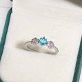 Silver ring featuring square sky blue gemstone and pink flower accents on velvet box - Sky Blue Square Main Stone Pink Pave Diamond Flower Style (白金色20)