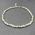 Close-up of irregular natural gemstone beads necklace with stainless steel lobster clasp - Amazonite