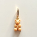 Detail of cream gummy bear pendant with gold rhinestone clasp on resin necklace - Light Coffee