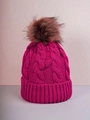 Fuchsia cable knit beanie for winter featuring a large brown faux fur pom pom - M (56-58cm) / Rose Red