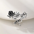 Vintage silver cat brooch holding a black rose flower with textured antique finish - Silver Cat with Rose (DW0429) / Antique Silver