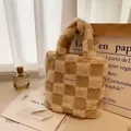 Detail of waffle fleece lamb wool tote bag with checkerboard pattern and woven label - Rice Camel