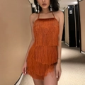 Dettaglio di un vestito arancione acceso con frange, scollo all'americana e nappe - XS / caffè