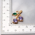 Detail of cherry fruit pendant with purple gems and ruler showing 2.5cm size - Style 25