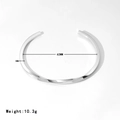 Minimalist silver twist open cuff bracelet featuring 62mm inner diameter and 3mm width - Platinum