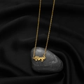 Gold Virgo zodiac necklace with artistic font pendant on black textured stone and silk - Virgo Gold