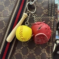 Mini baseball keychain detail with wooden bat and glove on a patterned bag - 3.5CM Yellow/Bright Red