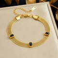 Gold mesh chain stainless steel bracelet with three rectangular black gemstones - Polar Black (B1964)
