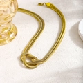 Minimalist double-layer golden snake chain necklace with a stylish knotted metal design - Necklace / Gold