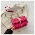 Quilted bright pink crossbody bag with gold chain strap and elegant tassel detail - Rose Pink