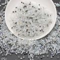 Mixed white, crystal and silver square glass beads set in a white ceramic bowl - White