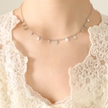 Silver teardrop fringe necklace in titanium steel on model with lace top - Steel Teardrop Necklace / 40+5cm