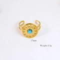 Detailed macro view of 14k gold plated turquoise ring with 17mm diameter and 3.3g weight - Vintage Hollow Turquoise Style