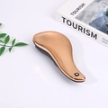 Rose gold electroplated cushion hairbrush for detangling on a white table background - Electroplated Rose Gold