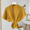 Elegant yellow knitted hollow shawl wrap for women, styled with a front knot for summer wear - Ginger Yellow
