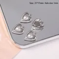 Detail view of four silver heart charms with pearls on mirror tray, size 21x17mm - Pointed Pearl Heart