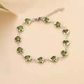 Elegant stainless steel bracelet with 11 heart-shaped emerald green glass stones - Light Green