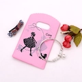 Silver adjustable bangle with bell charms and beads on cute pink gift packaging - No. 4 (Cute Girl Illustration)