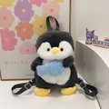 Cute plush penguin backpack featuring gray and white fur holding a blue soft fish toy - Dark Gray with Fish