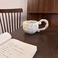 Irregular cream ceramic coffee cup with hand-painted yellow stars and floral pattern - Korean Donut Style Single Mug / Single Cup
