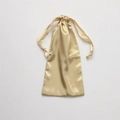 Elegant gold silk satin drawstring storage pouch with a smooth glossy finish for accessories - Gold