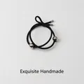 Minimalist black elastic hair tie featuring dual polished silver metallic beads - 22# Silver Round Ball Hair Rope