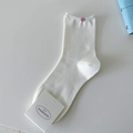 White cotton mid-tube knit socks with pink round logo detail and premium paper packaging - One Size / Cream