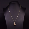 Elegant gold-plated pearl necklace with a translucent gemstone pendant on a black bust - Pink Crystal Long Pendant Necklace