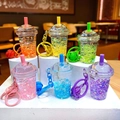 Détail de porte-clés tasse à thé au lait avec paillettes liquides et cloches colorées - Style Fermoir Mousqueton / Style de tasse de boisson froide multicolore (Mélange aléatoire)