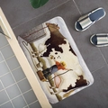 Detail of rectangular cow farm mat on grey tiles with blue striped slippers - 40x60cm / Farm Life