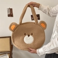 Detail of cute brown teddy fleece tote bag with bear ears and soft plush texture - Khaki