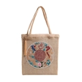 Borsa tote in paglia intrecciata con ricamo tradizionale e nappina gialla - Beige
