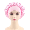 Close-up of pink satin hair bonnet featuring elastic wide band and soft pleats - One Size / Pink