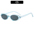 Gafas de sol ovaladas vintage con montura azul claro transparente y lentes gris oscuro - Marco Azul Transparente Lente Gris