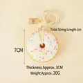 Pink PU faux donut charm with colorful sprinkles and 7cm handmade bagel tag - White
