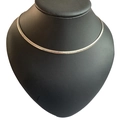 Flat silver stainless steel omega snake chain necklace with textured finish on display - 4mm / Silver