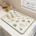 Absorbent cream kitchen drying mat with green border and vegetable doodle illustrations - Kitchen Green Impression