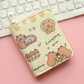 Close-up of beige Capybara zipper wallet featuring cute cartoon dessert patterns - Wins Capybara